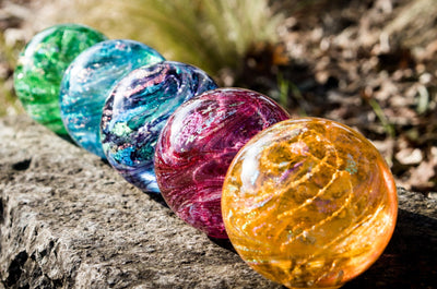 glass orb with cremation ash